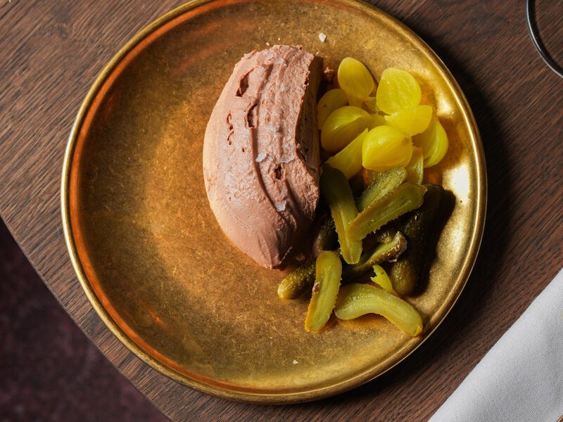 Pate de volaille with Amsterdam pickles on brass plates